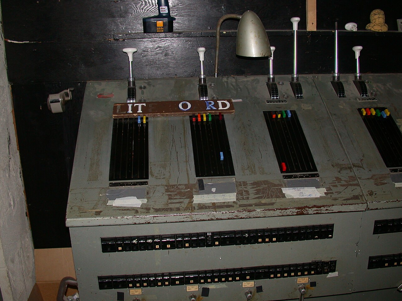 The school’s old wooden “Lite Board,” likely original to the building, photographed in 2003.